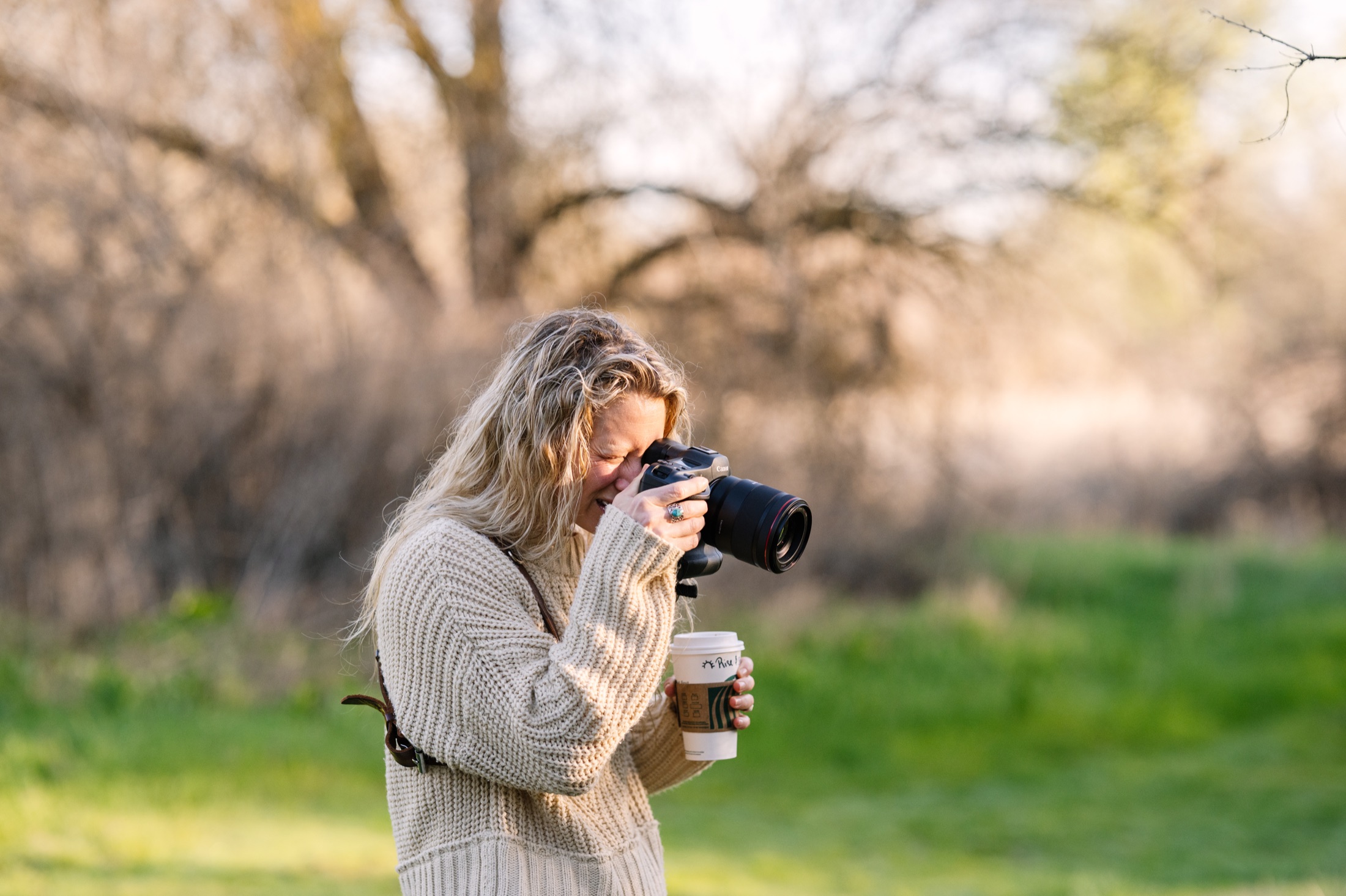Lisa Weiss photographing a portrait session outdoors